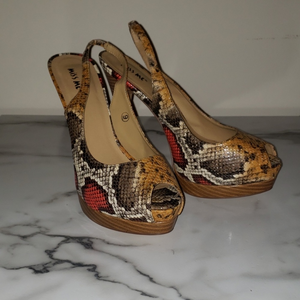 snakeskin peeptoe pumps